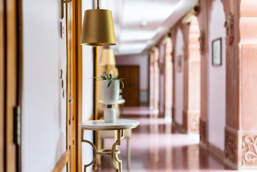 Elegant corridor of a heritage hotel in Bikaner, showcasing Indian architectural charm and luxury design.